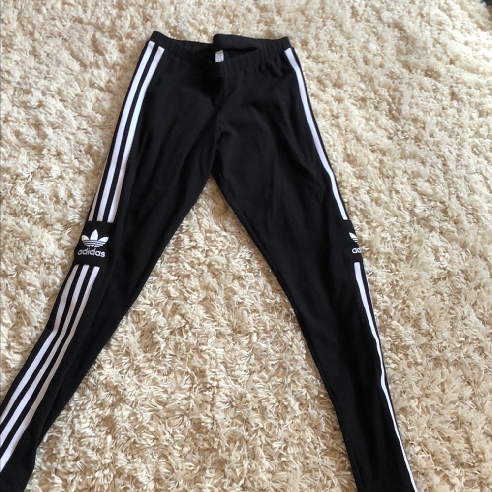 Adidas leggings with tre-foil adidas logo.